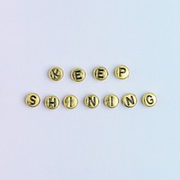 KEEP SHINING beads word typography on pastel