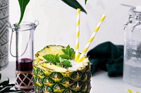 Pineapple drink with coconut cranberry syrup
