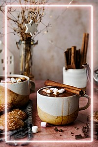 Neon frame psd with marshmallows dipped in hot chocolate Christmas food photography