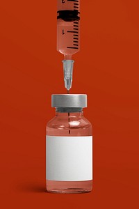 Blank white label on injection bottle glass vial with syringe