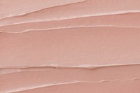 Pink frosting texture background close-up