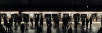 People waiting for a train on a platform