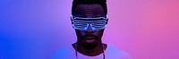 Black man wearing neon glasses