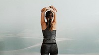 Woman stretching her arms before workout