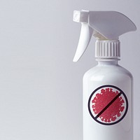 Alcohol sanitizer in a white spray bottle