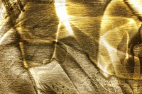 Silky golden fabric textured background