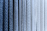 Blueish fabric stacks textured background