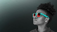 Black woman wearing teal sunglasses