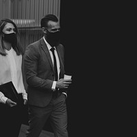 Businesspeople wearing face masks during coronavirus pandemic monochrome