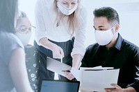 Business team wearing face masks during coronavirus pandemic