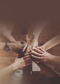 Diverse business teamwork stacking hands