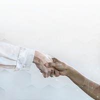 People shaking hands in business agreement background