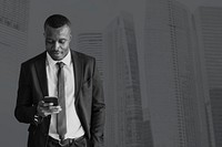 Businessman working using smartphone monochrome