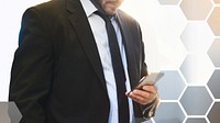 Businessman staring at smartphone background