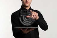 Futuristic digital presentation by a businessman in black shirt 