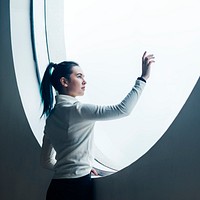 Girl using touch screen in a modern smart home