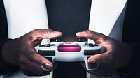 Hands holding video game controller