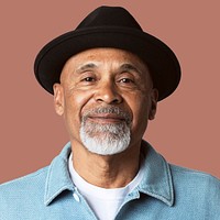 Mature man smiling face closeup portrait on brown background