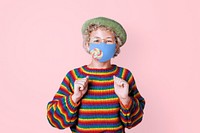 Boy wearing face mask to prevent Covid 19