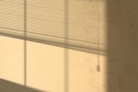 Background psd with window blinds shadow during golden hour