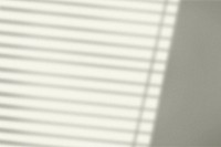 Background psd with window blinds shadow during golden hour