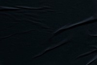 Wrinkled black paper background, simple design 