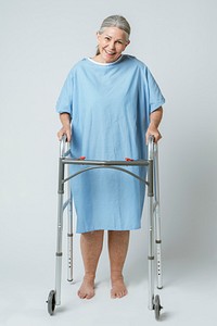 Happy patient in a hospital gown with a zimmer frame 