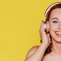 Woman listening to music through her headphones