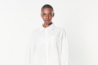 Black woman wearing a white shirt dress 