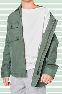 Boy wearing green jacket in studio