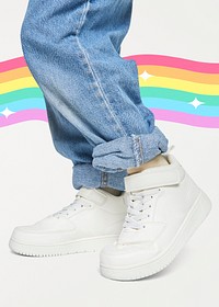 Girl with jeans white sneakers studio shot