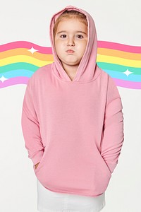 Little cute girl in pink hoodie in studio