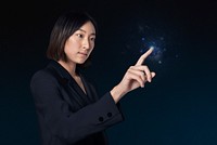 Young businesswoman  pointing on invisible screen