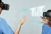 Doctors wearing VR simulation with hologram medical technology