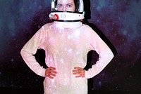 Female astronaut with space suit in outer space