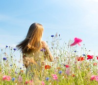 Free woman in flower field image, public domain spring CC0 photo.