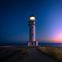 Cap de Barbaria lighthouse at sunset. Original public domain image from Wikimedia Commons