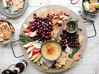 Cheeseboard with assorted delicacies. Original public domain image from <a href="https://commons.wikimedia.org/wiki/File:Game_Day_Eats_(Unsplash).jpg" target="_blank">Wikimedia Commons</a>