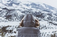 A woman wearing a fur hood jacket on a mountain in Lake City. Original public domain image from <a href="https://commons.wikimedia.org/wiki/File:Lost_(Unsplash).jpg" target="_blank" rel="noopener noreferrer nofollow">Wikimedia Commons</a>