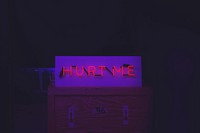 Red neon &quot;Hurt Me&quot; sign. Original public domain image from <a href="https://commons.wikimedia.org/wiki/File:Bethnal_Green_Road,_London,_United_Kingdom_(Unsplash).jpg" target="_blank">Wikimedia Commons</a>