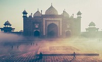 Tourist walk past ornate temples and architecture in Agra. Original public domain image from Wikimedia Commons