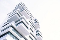 A white modern apartment building in Berlin. Original public domain image from Wikimedia Commons