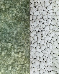 Green mosaic next to round white stones. Original public domain image from <a href="https://commons.wikimedia.org/wiki/File:Split_Stone_Toning_(Unsplash).jpg" target="_blank" rel="noopener noreferrer nofollow">Wikimedia Commons</a>
