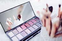In-focus shot of a makeup palette and brushes.. Original public domain image from <a href="https://commons.wikimedia.org/wiki/File:Makeup_brushes_and_eyeshadows_(Unsplash).jpg" target="_blank" rel="noopener noreferrer nofollow">Wikimedia Commons</a>
