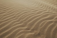 Sand dunes during daytime. Original public domain image from Wikimedia Commons