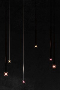 Gold sparkles patterned on black background vector