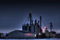 A seed grain plant in Wetaskiwin, Alberta, Canada. Original public domain image from <a href="https://commons.wikimedia.org/wiki/File:Seed-Grain-Plant-Wetaskiwin-Alberta-Canada-03-A.jpg" target="_blank" rel="noopener noreferrer nofollow">Wikimedia Commons</a>