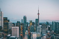 Toronto cityscape in twilight with CN Tower. Original public domain image from Wikimedia Commons