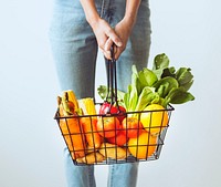 Shopping basket full of fruits and vegetables