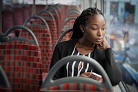 Businesswoman riding the bus to work